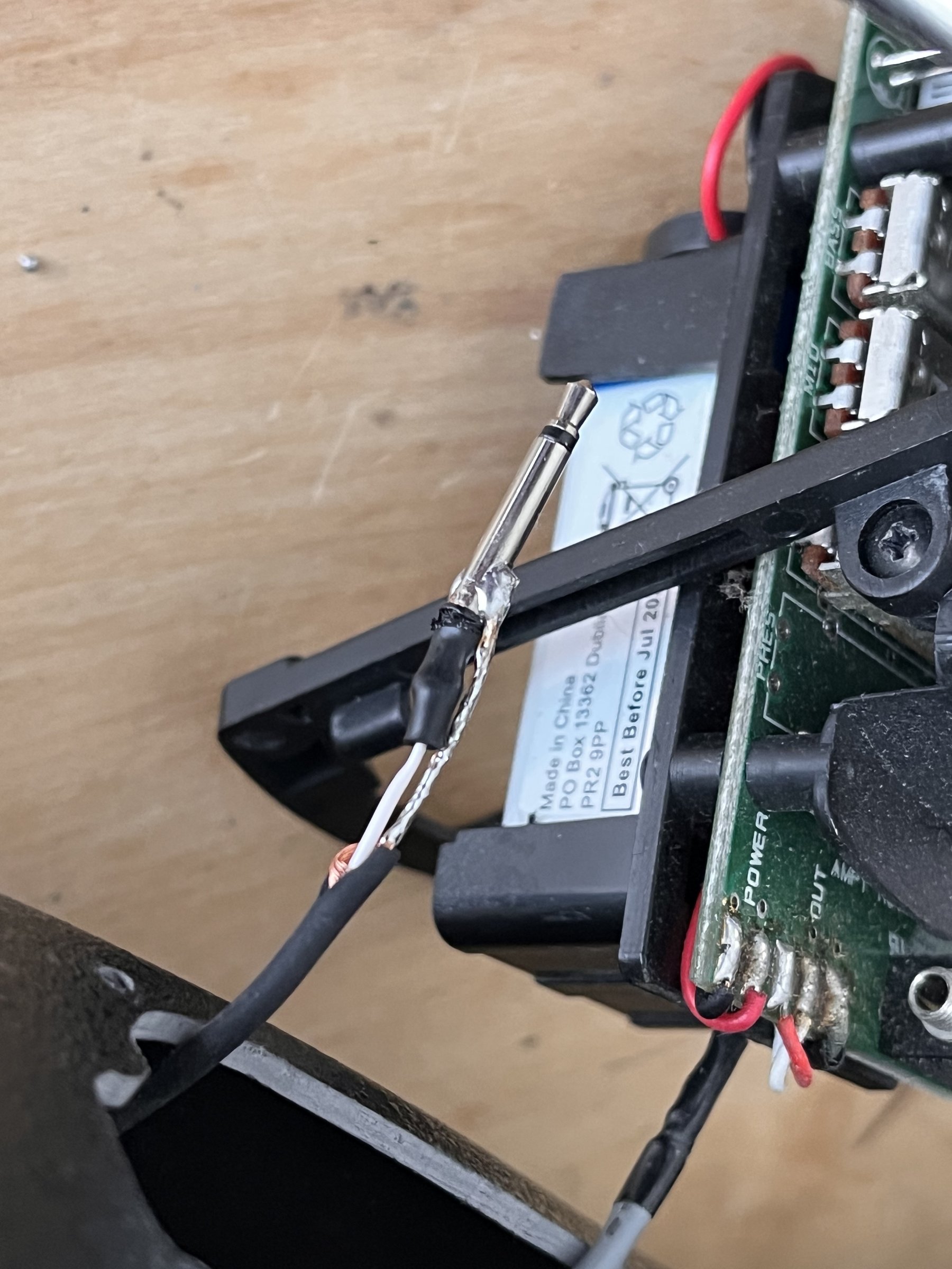 Wire re-soldered to the output jack after cutting back the corroded section