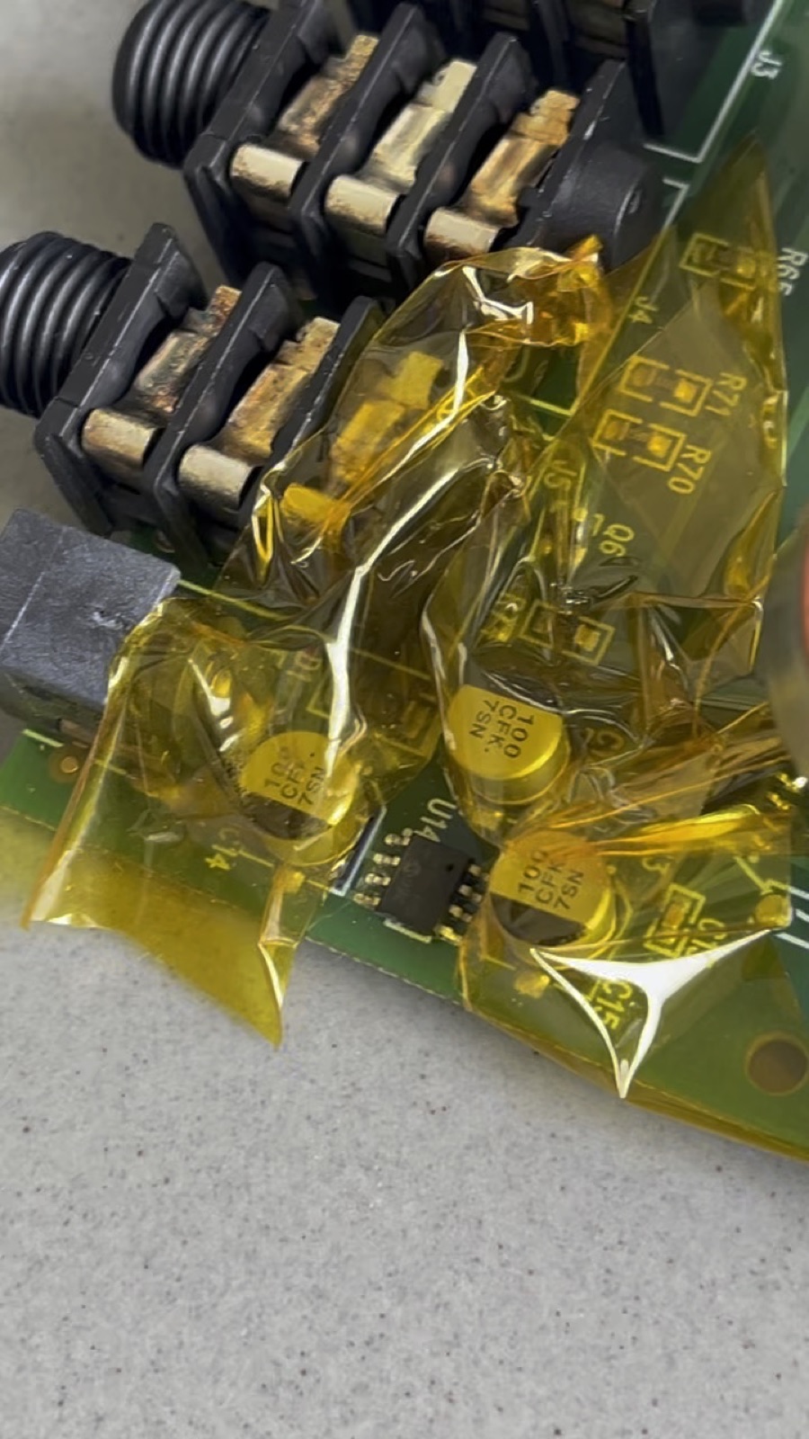 Kapton tape protecting components on the Moogerfooger PCB during SMD rework